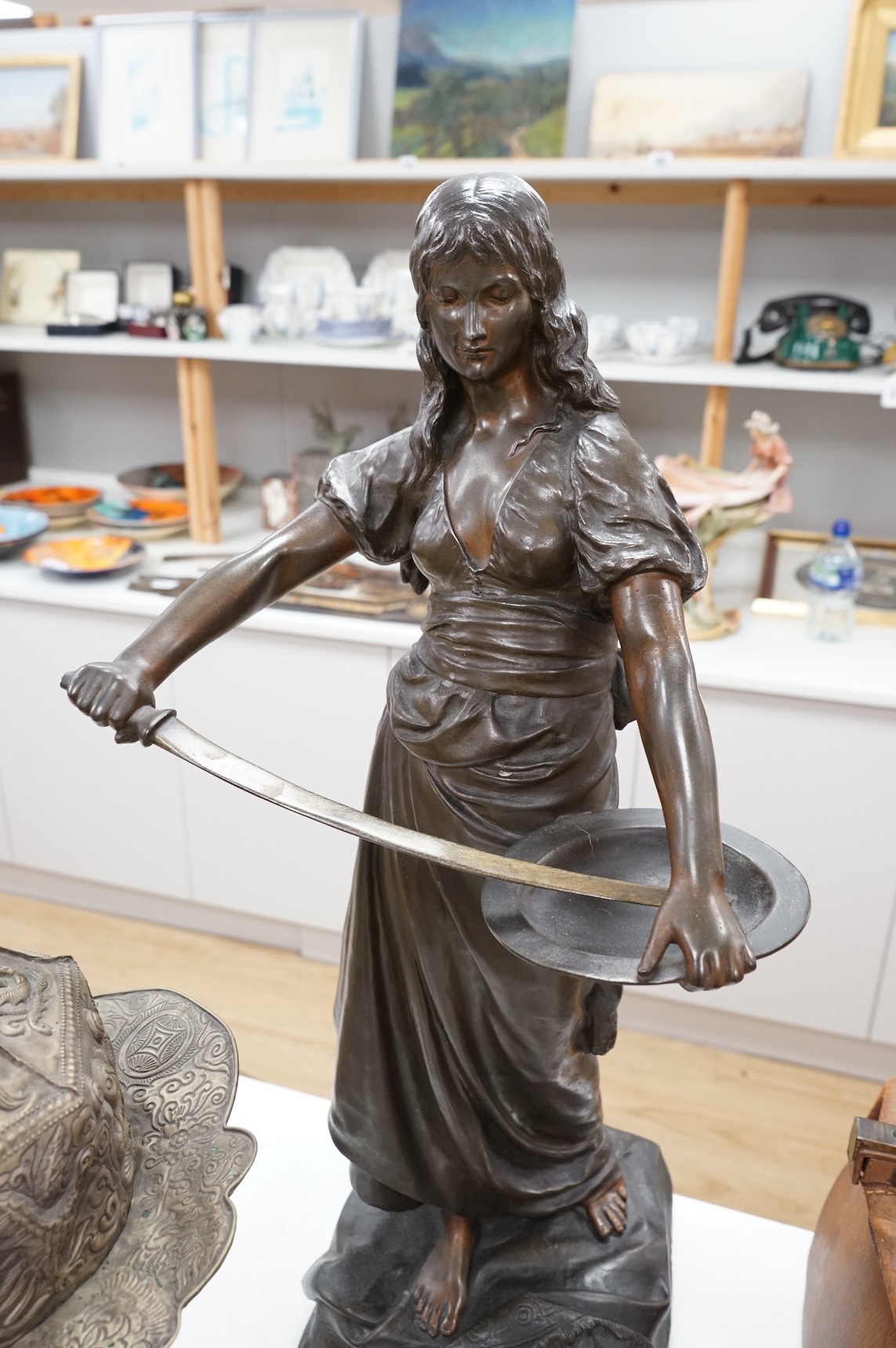 A large French patinated spelter figure of Salome, late 19th century, 75cm high